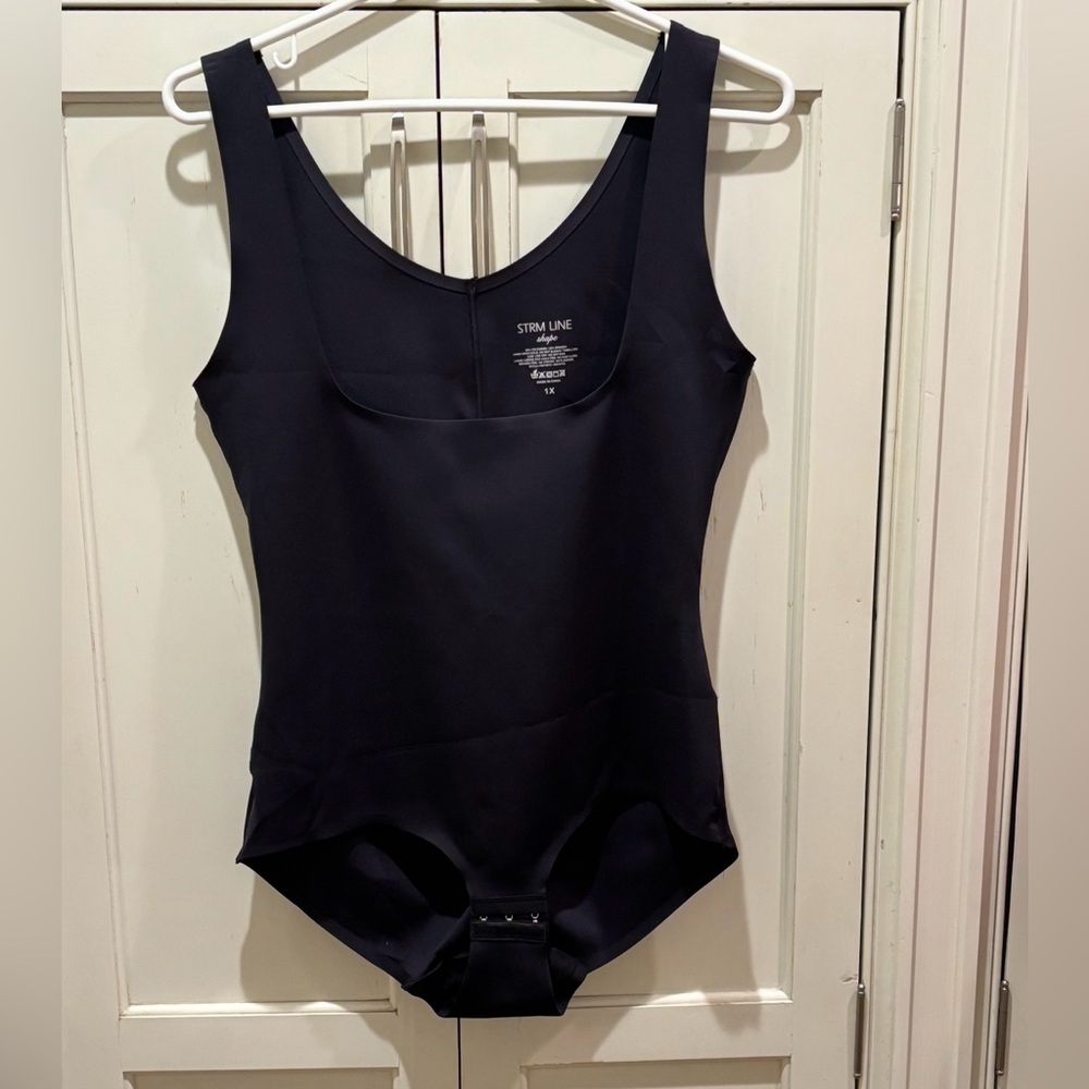 NWOT  Strm Line Shape bodysuit in solid black. Sz 1X. Never used